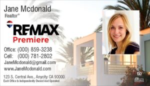 remax business card with faded house background