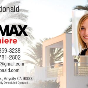 remax business card with faded house background