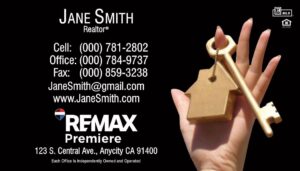 remax no photo black business card with door key in hand background